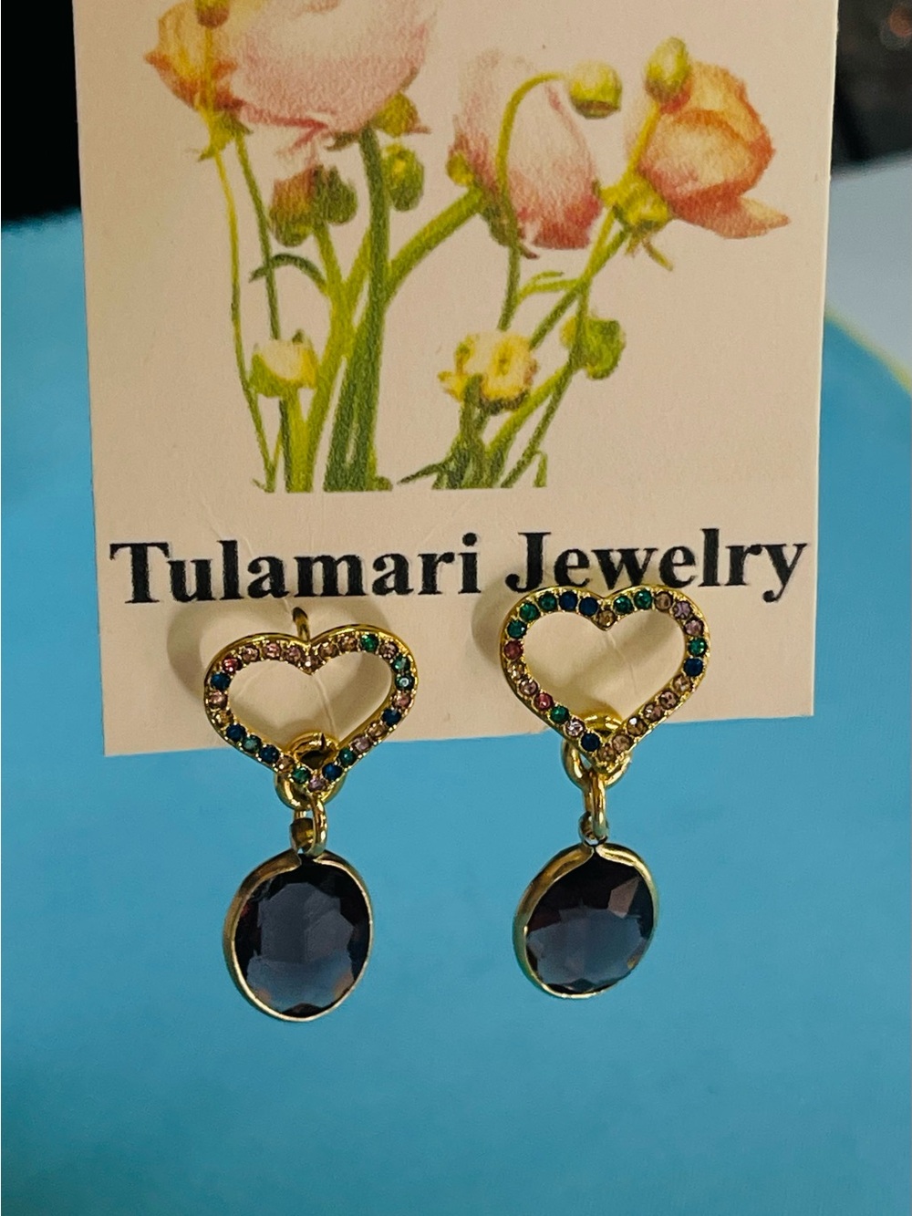 Gold Heart Drop Earrings with Blue Gem